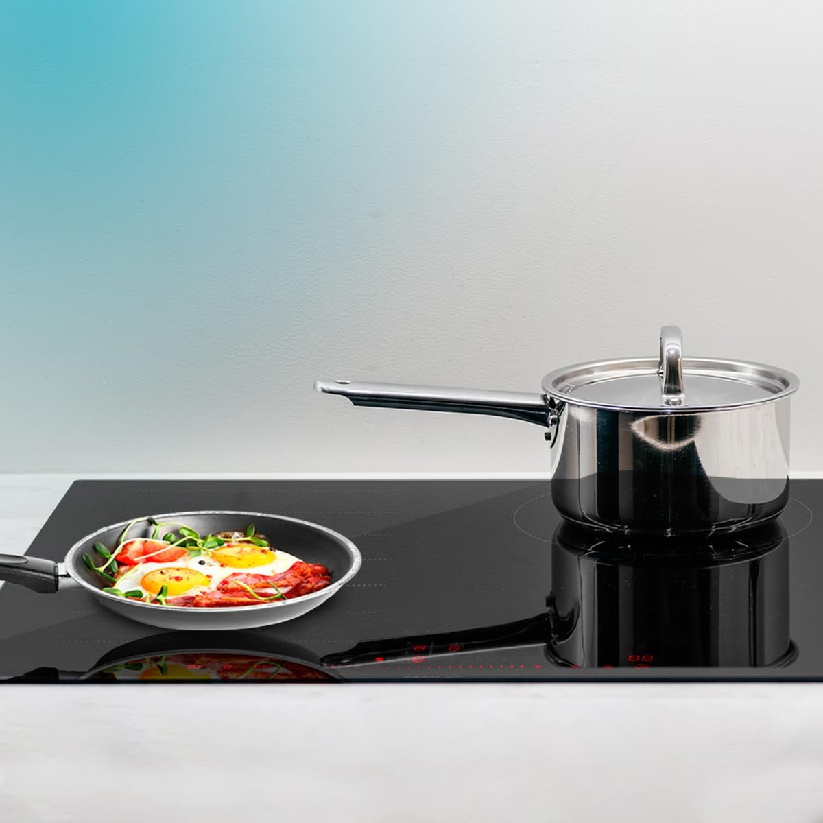 Induction hob with a pan, illustrating the pan detection feature