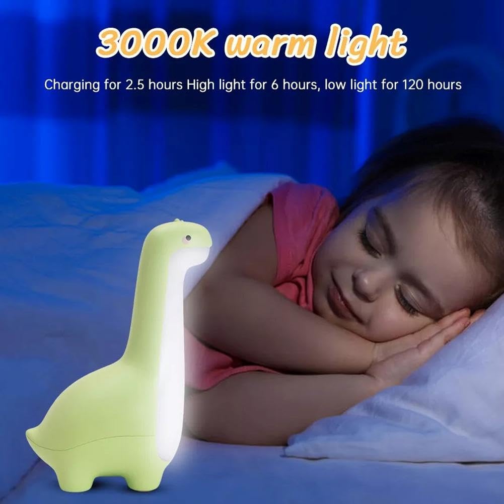 Green dinosaur night light emitting 3000K warm light next to a sleeping child, with text indicating charging time and battery life
