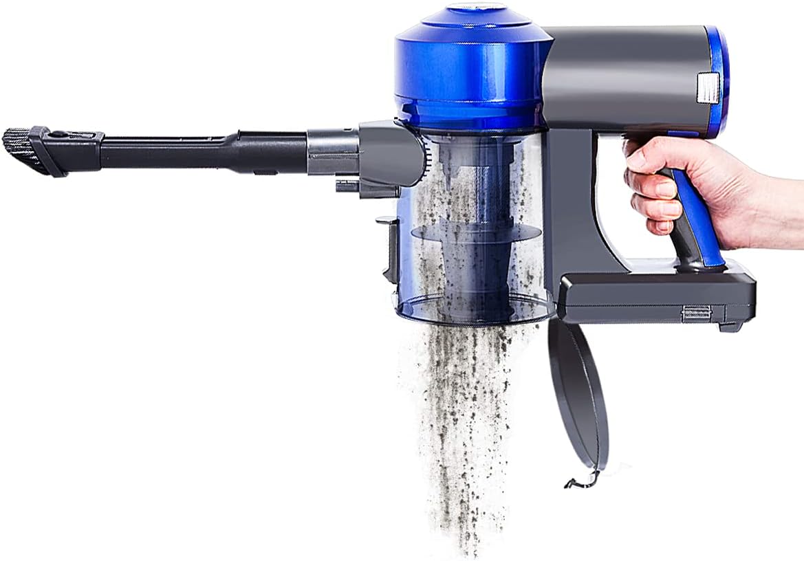 Hand holding the Enigma V8 main unit, emptying dust into a bin