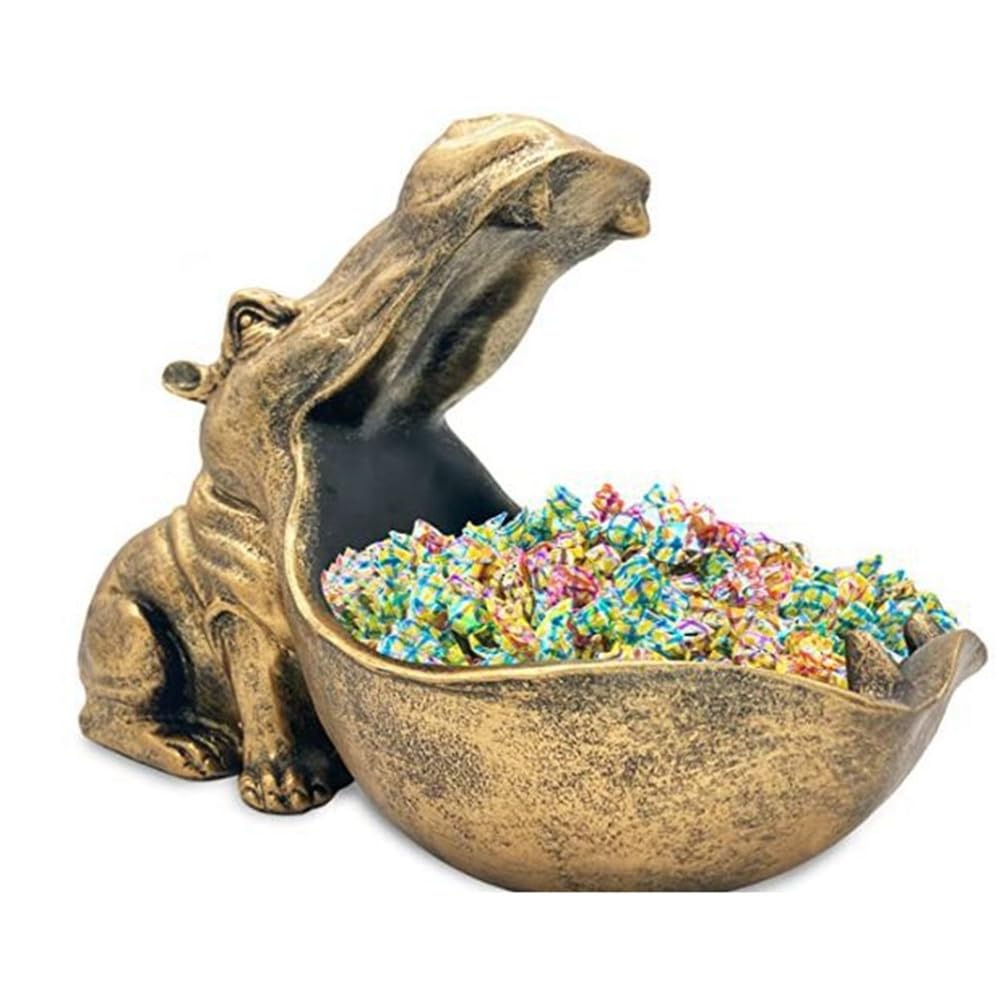 Statue hippopotame en résine dorée pour décorer une table d'entrée chic