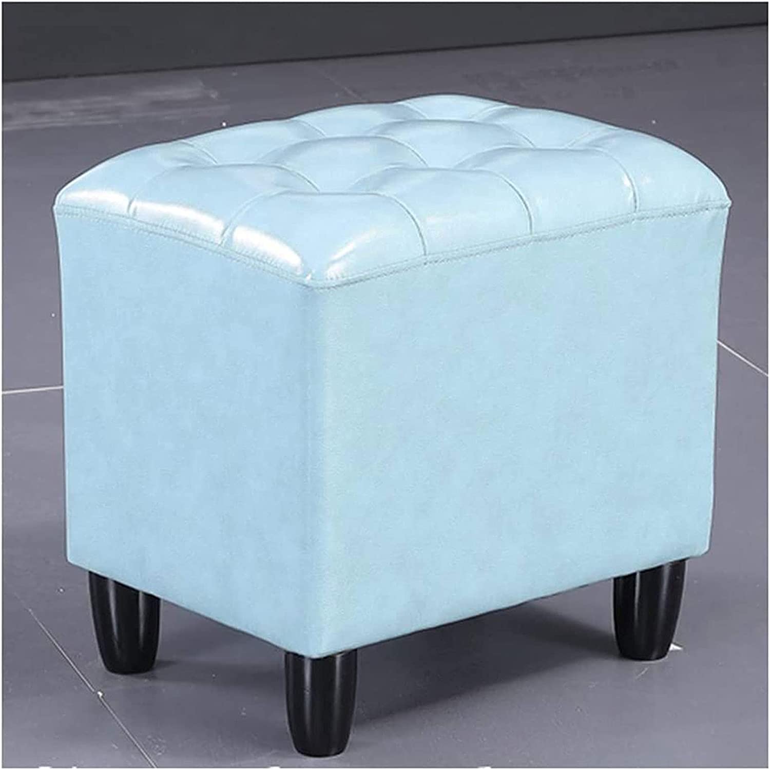 Petit pouf repose-pieds bleu en PU pour un salon chaleureux