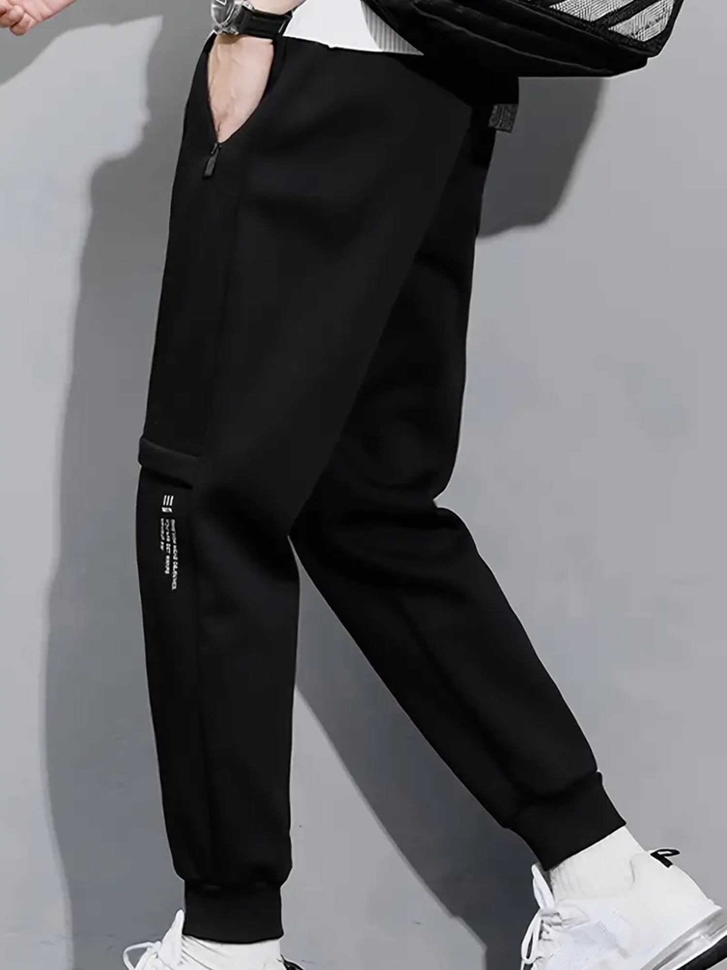 Lymio Męskie spodnie do biegania o kroju slim fit ze średnim stanem w pełni rozciągliwe (TP-47-49)