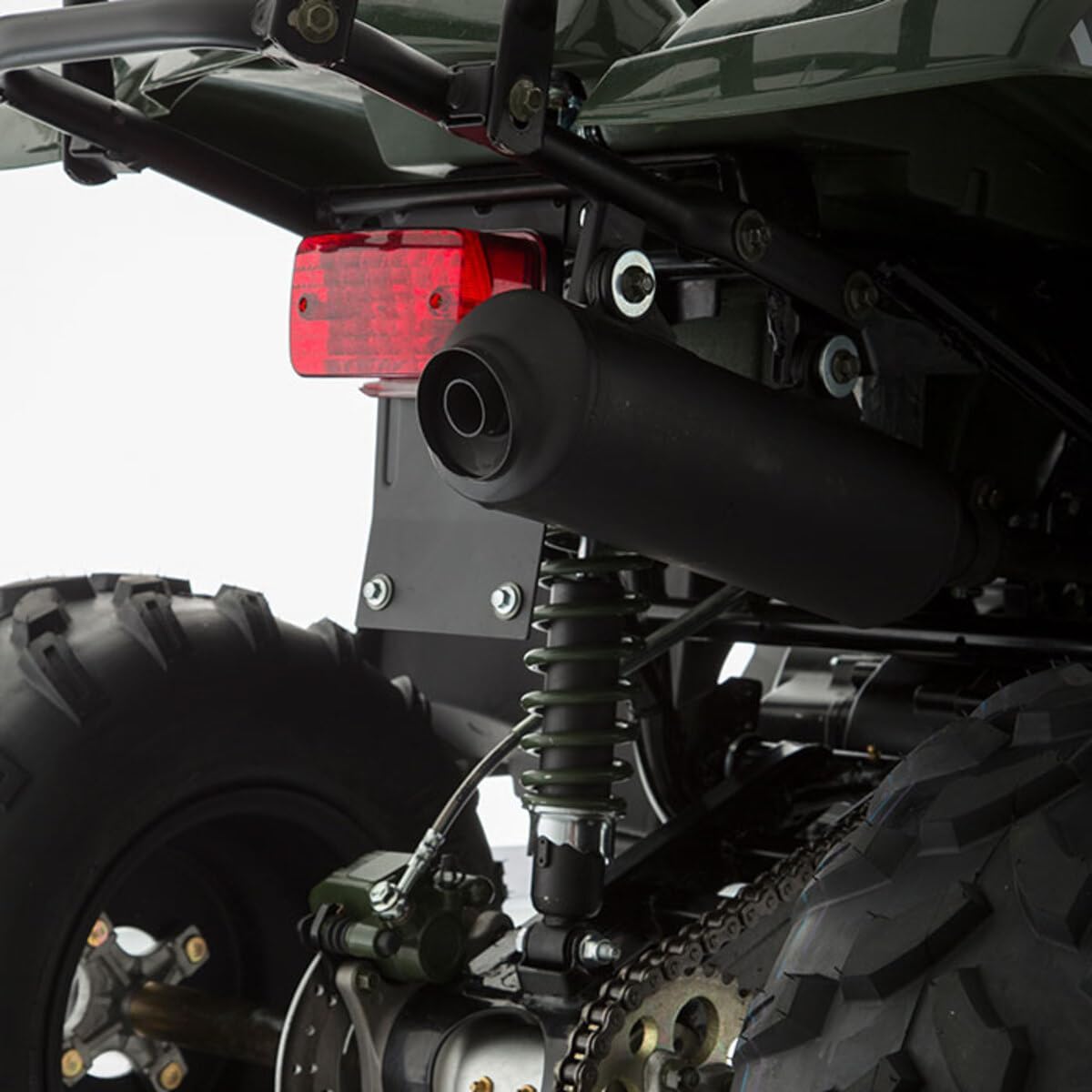 Close-up of ATV180 exhaust and rear brake