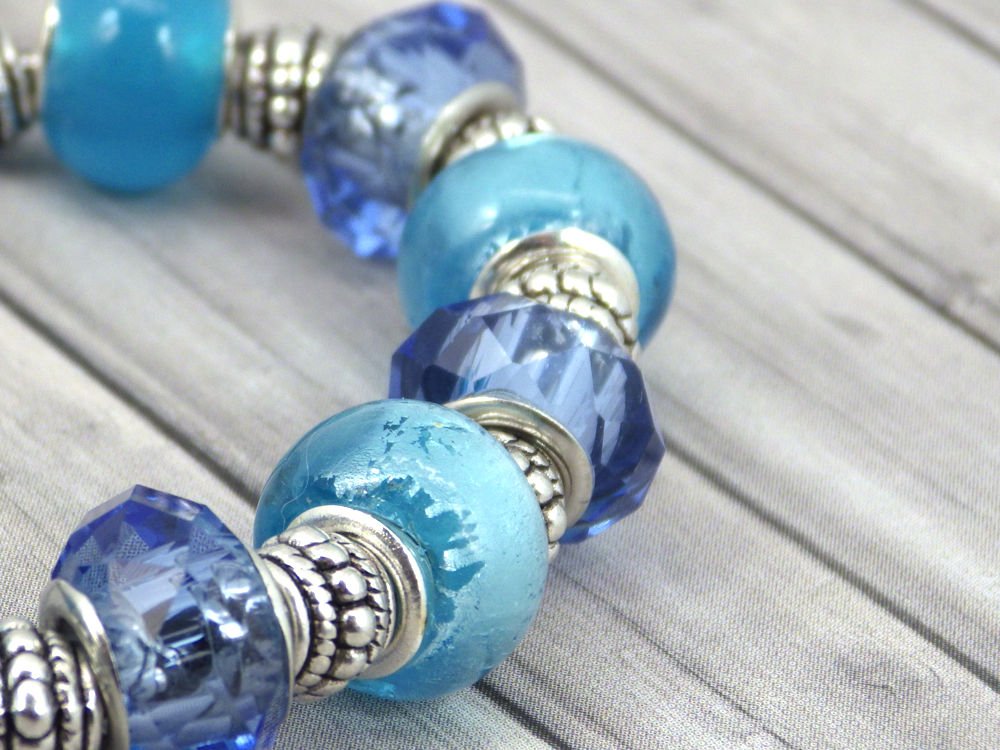 Pulsera Thurcolas Charms para mujer modelo Manhattan acero inoxidable con cuentas de vidrio azul
