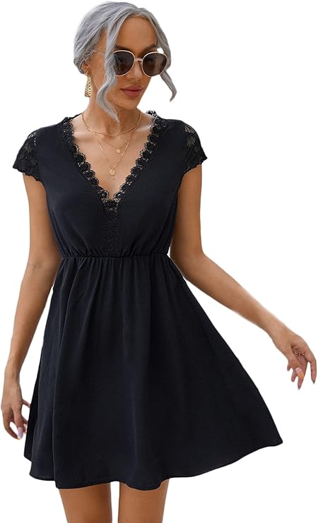 flowy black dress with flutter cap sleeves