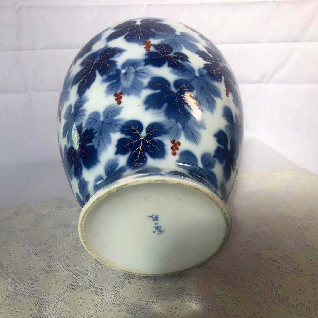 青白い葉模様の陶器花瓶 青い葉模様の陶器花瓶 約20㎝ 幅