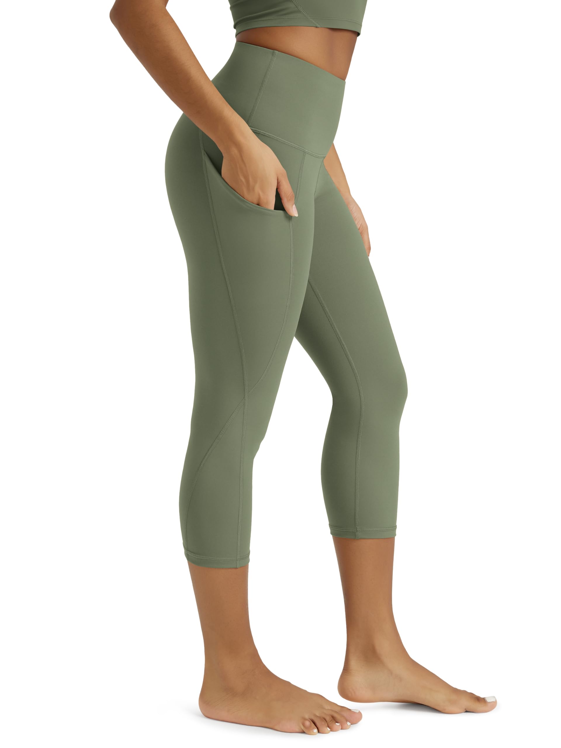 ODODOS Women's High Waisted Yoga Capris with Pockets, Tummy Control Non See Through Workout Athletic Running Capri Leggings