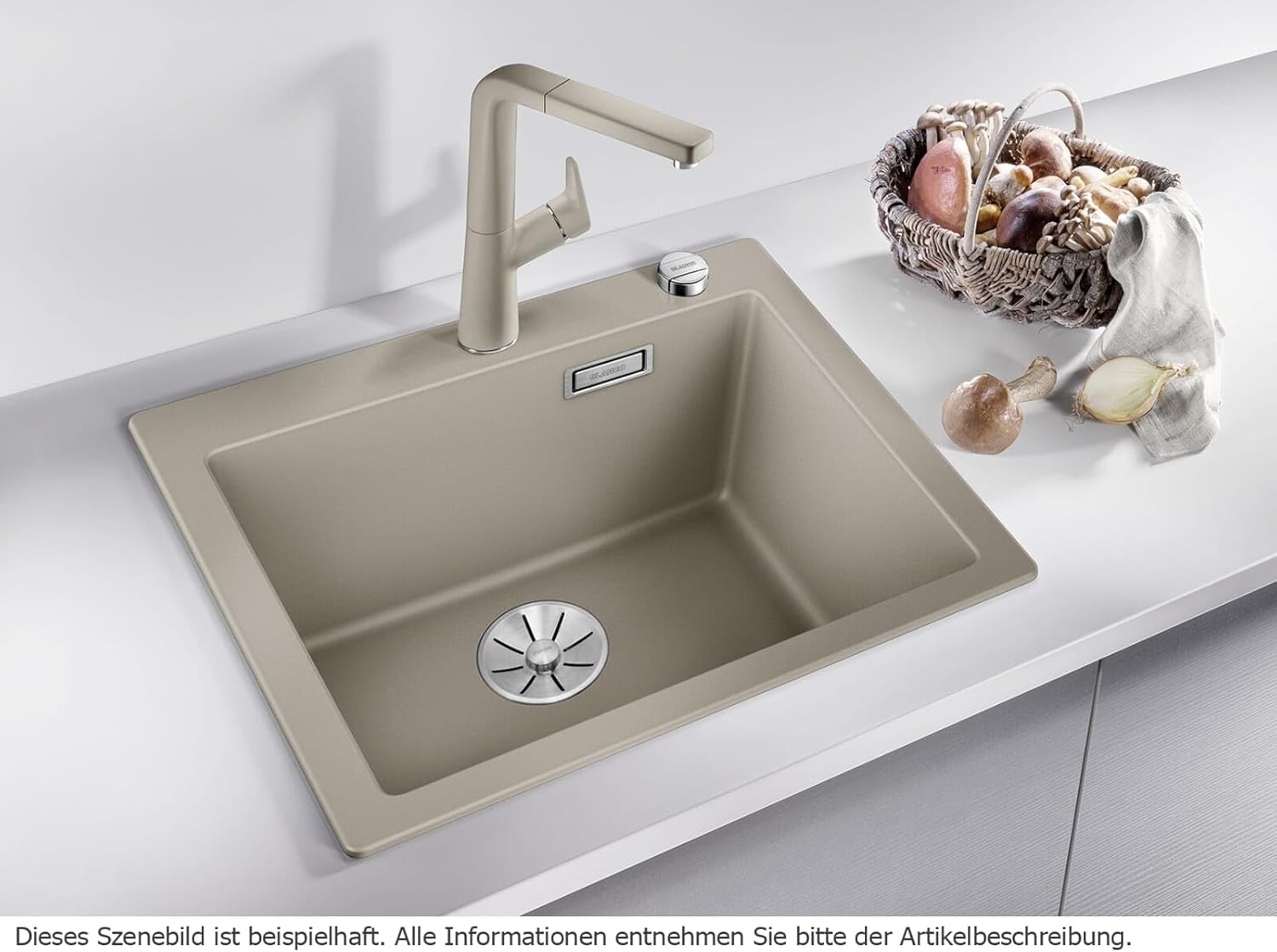 BLANCO Pleon 5 Silgranit sink installed in a kitchen countertop with a faucet and basket of vegetables.