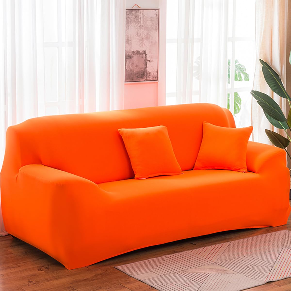 Housse de canapé extensible pour rénover un canapé usé facilement