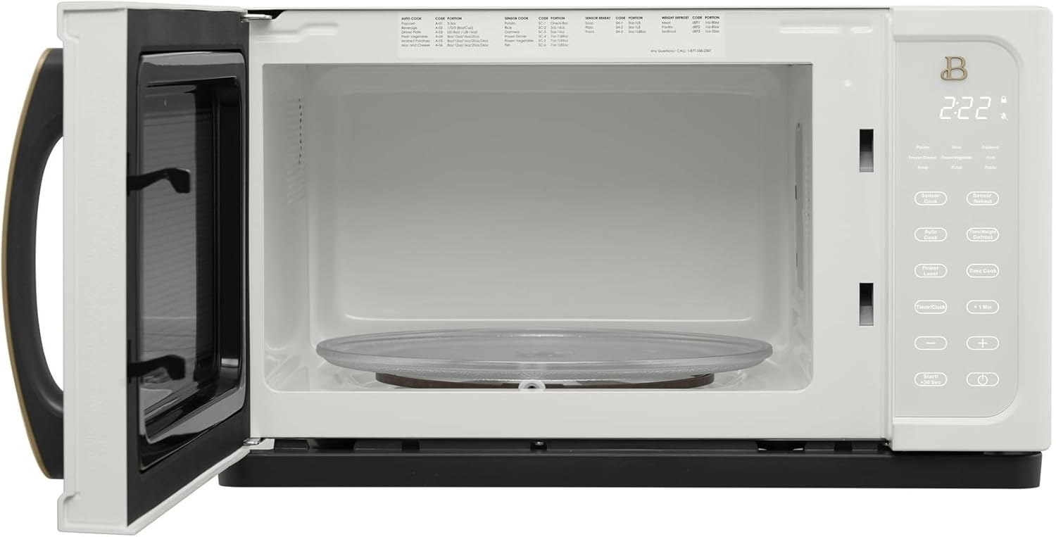 Microwave interior with turntable and roller ring