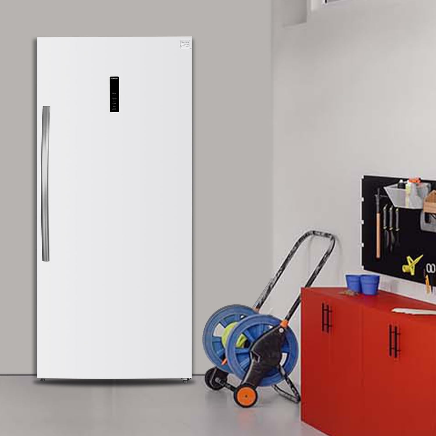 Diagram showing the Kenmore appliance converting between refrigerator and freezer modes, with examples of contents.