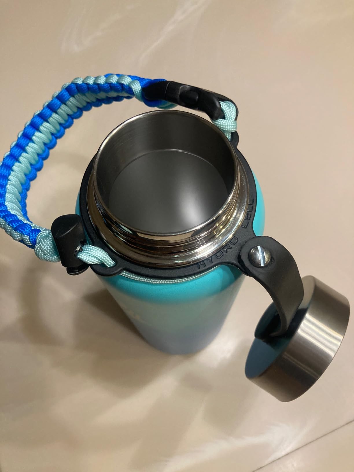 HYDRO CELL Paracord Handle For Wide Mouth Water Bottles - Adjustable Strap With Carabiner (Teal/White)
