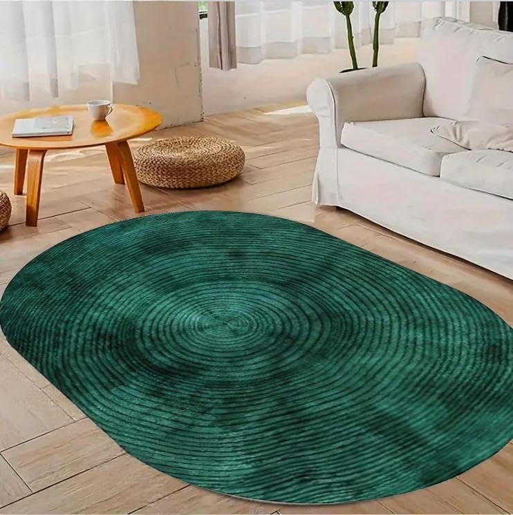 Alfombras ovaladas para suelos aburridos solucionando la falta de calidez con verde geométrico
