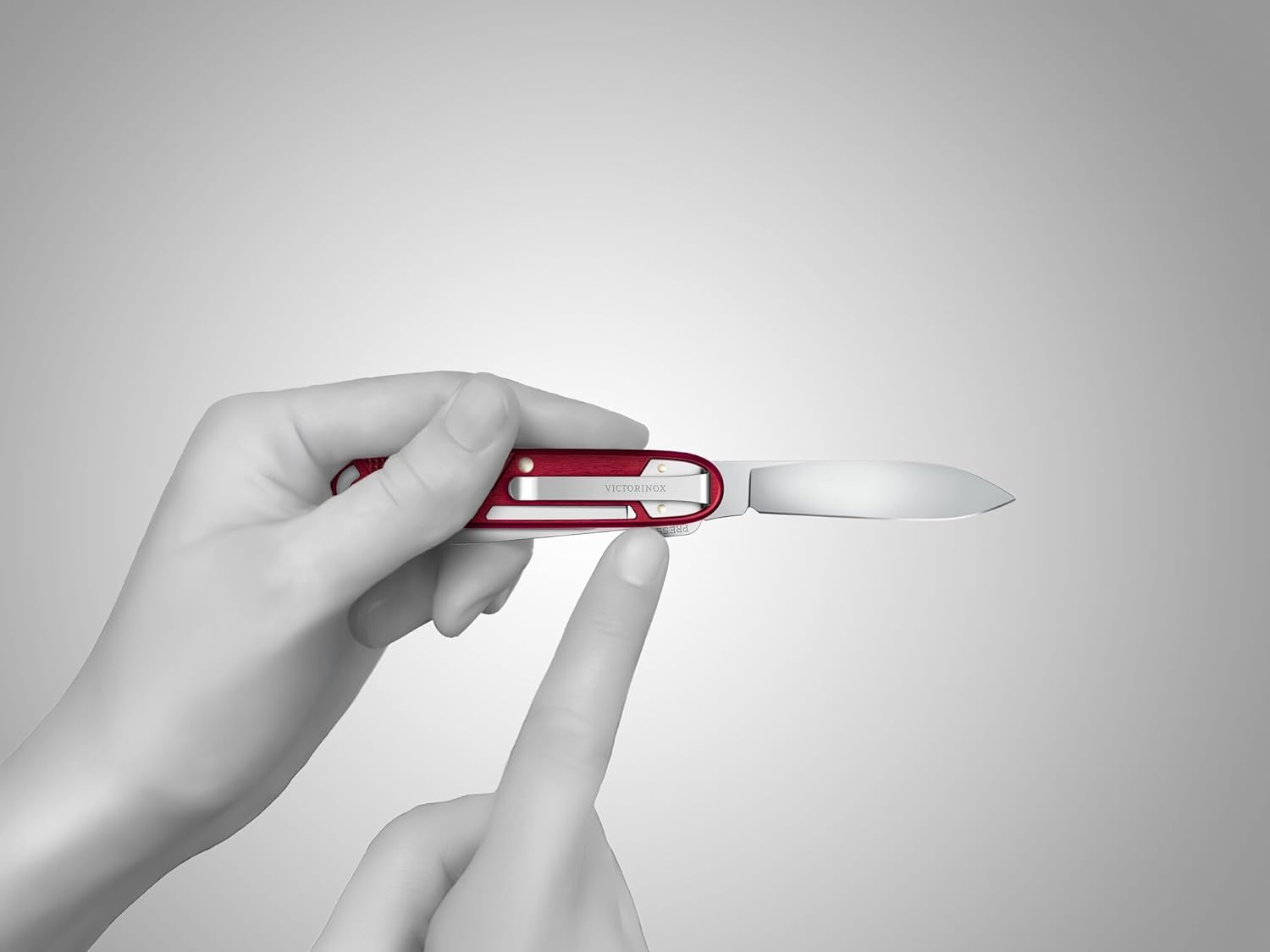 Victorinox Synergy X Alox Swiss Army Knife 10 Functions with Scissors and Carry Clip, Red