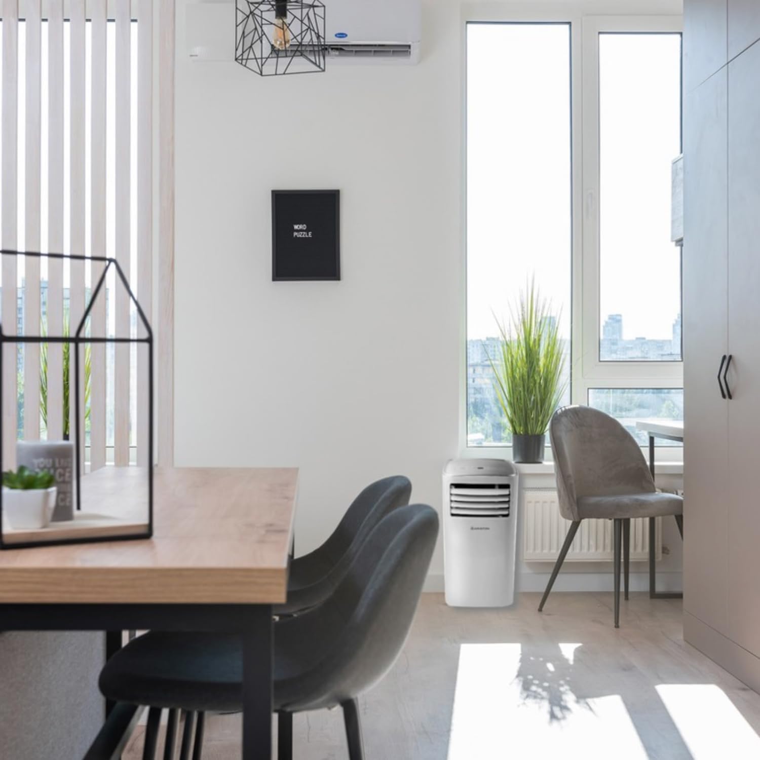 Ariston Mobis 8 Portable Air Conditioner placed in a room