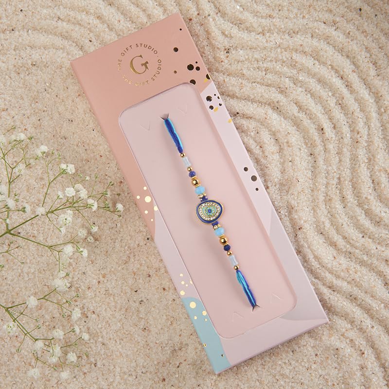 Image of THE GIFT STUDIO.COM | Evil Eye Stone Rakhi for Brother | Handmade Design | Blue Bead Raksha Bandhan Thread | Traditional Evil Eye Rakhi