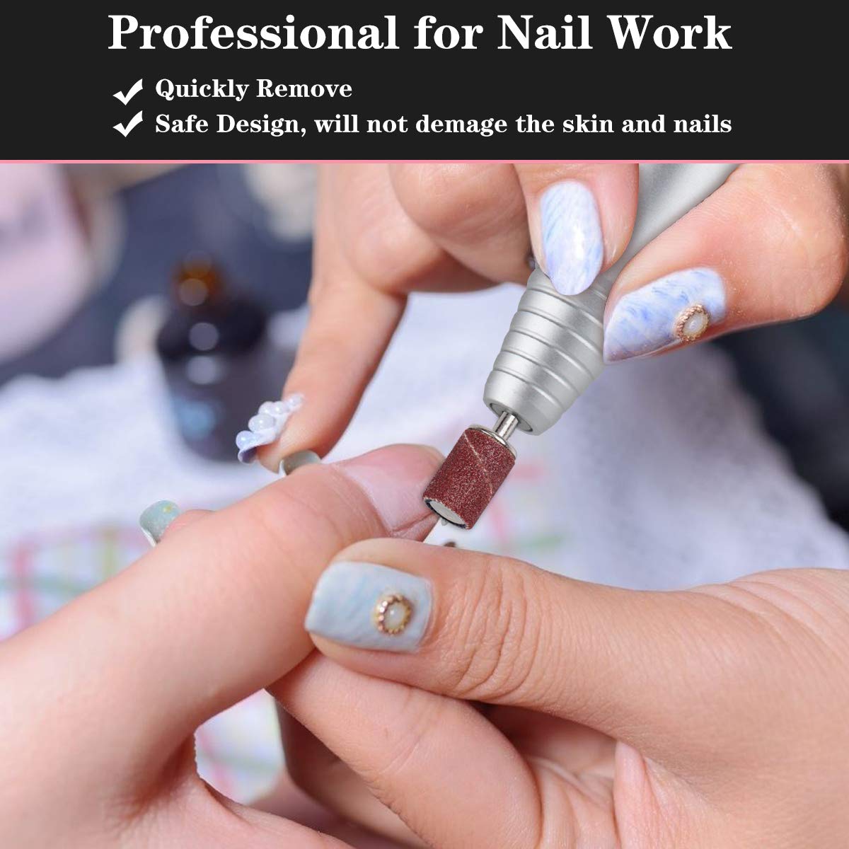 A sanding band attached to a nail drill being used on a fingernail