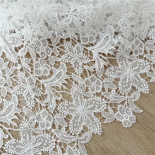 Tissu en dentelle brodée avec motif creux de haute manufacture