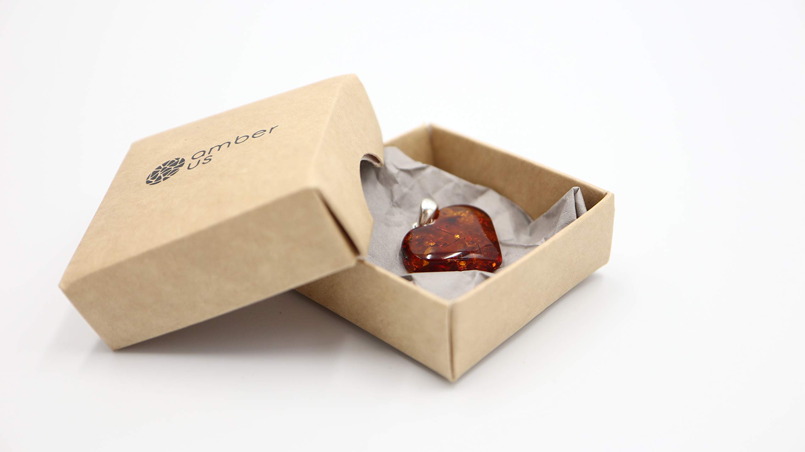 Ciondolo a forma di cuore in ambra baltica color cognac, con fiocco in argento Sterling 925