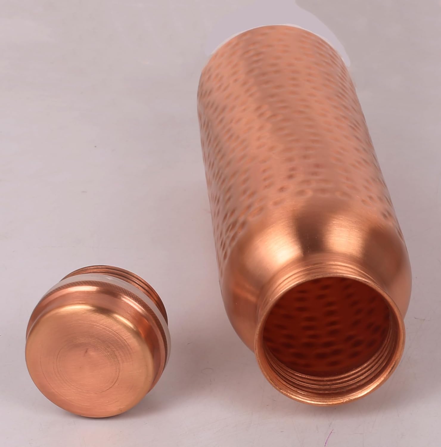 Pure Copper Water Bottle - Handcrafted - Ayurveda health benefits - Large 35 oz - Leak proof, Easy to carry for Sports, Fitness, Yoga, School - Natural Hammered Beaten Copper Finish - Image 8
