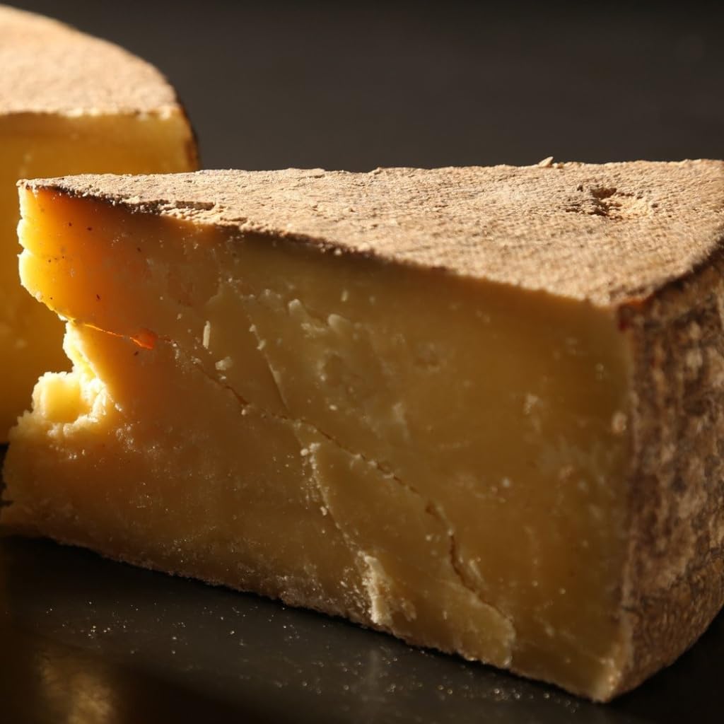 Comté d'été AOP Vieux - 1kg - 36 mois d'affinage - fabrication artisanale - Pâte jaune avec cristaux et saveur noisette intense