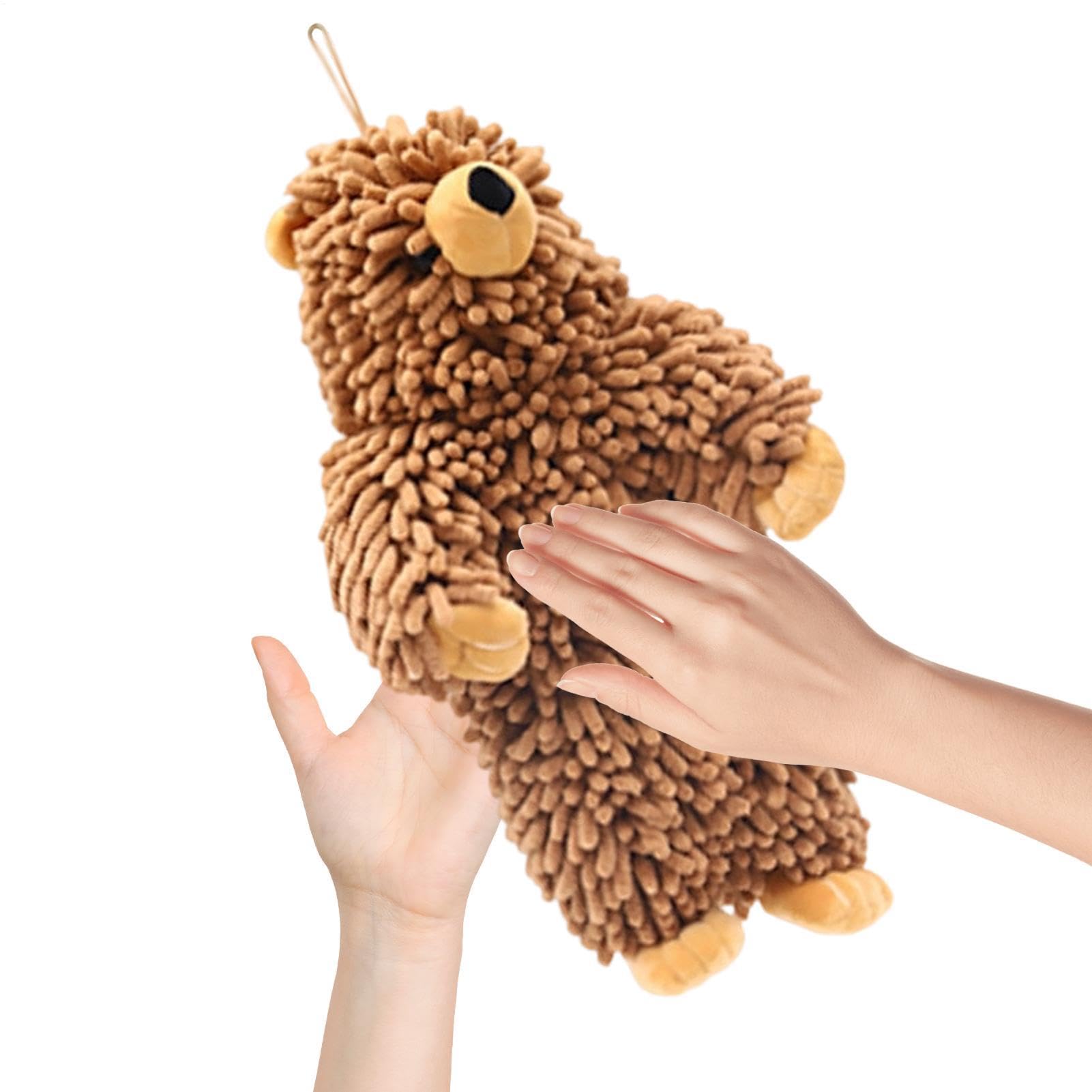 Pañuelo de felpa de oso absorbente para decorar y secar las manos en el baño de casa.