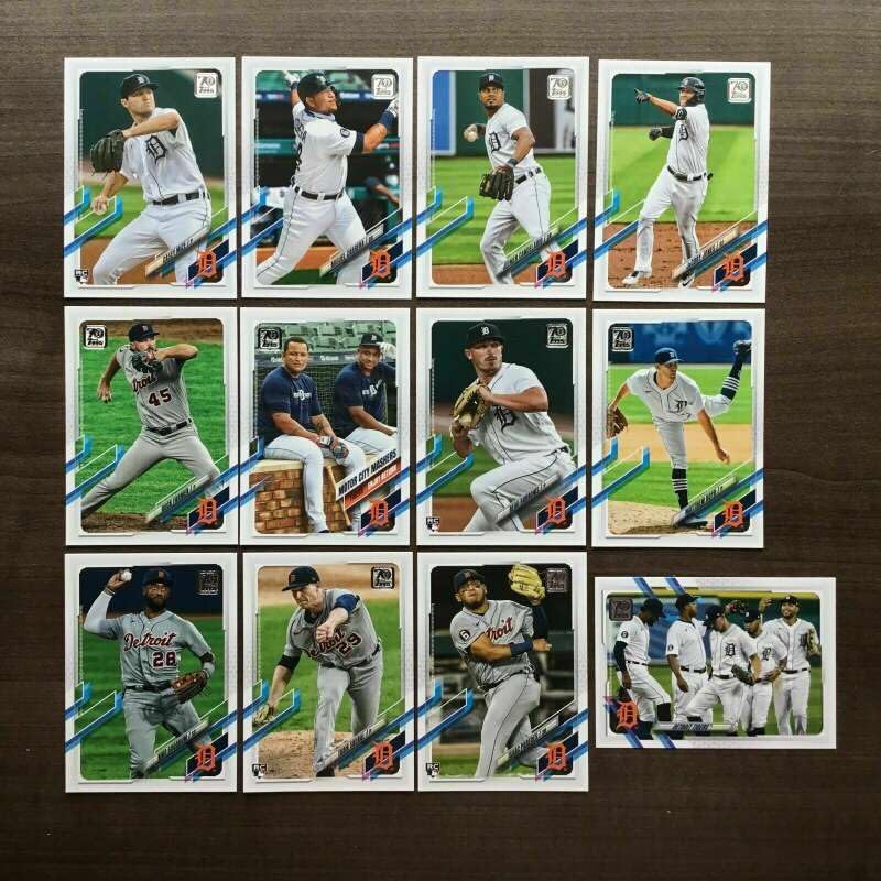 2021 Topps Series 1 Baseball Detroit Tigers Base MLB Hand Collated Team Set in Near Mint to Mint Condition of 12 Cards:65 Isaac Paredes RC - 70 Detroit Tigers Team Card - 92 Tarik Skubal RC - 97 Niko Goodrum - 121 Matthew Boyd - 123 Beau Burrows RC 152 Motor City Mashers – 158 Buck Farmer - 213 JaCoby Jones - 217 Jeimer Candelario - 291 Miguel Cabrera - 321 Casey Mize RC