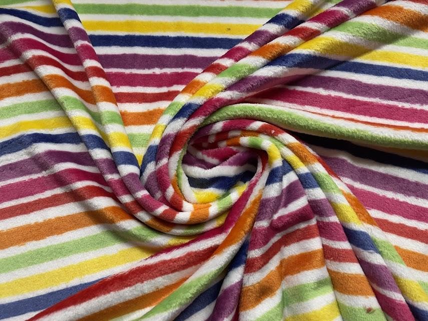 Tissu polaire double face fuchsia motif rayures pour couture de plaid 5m