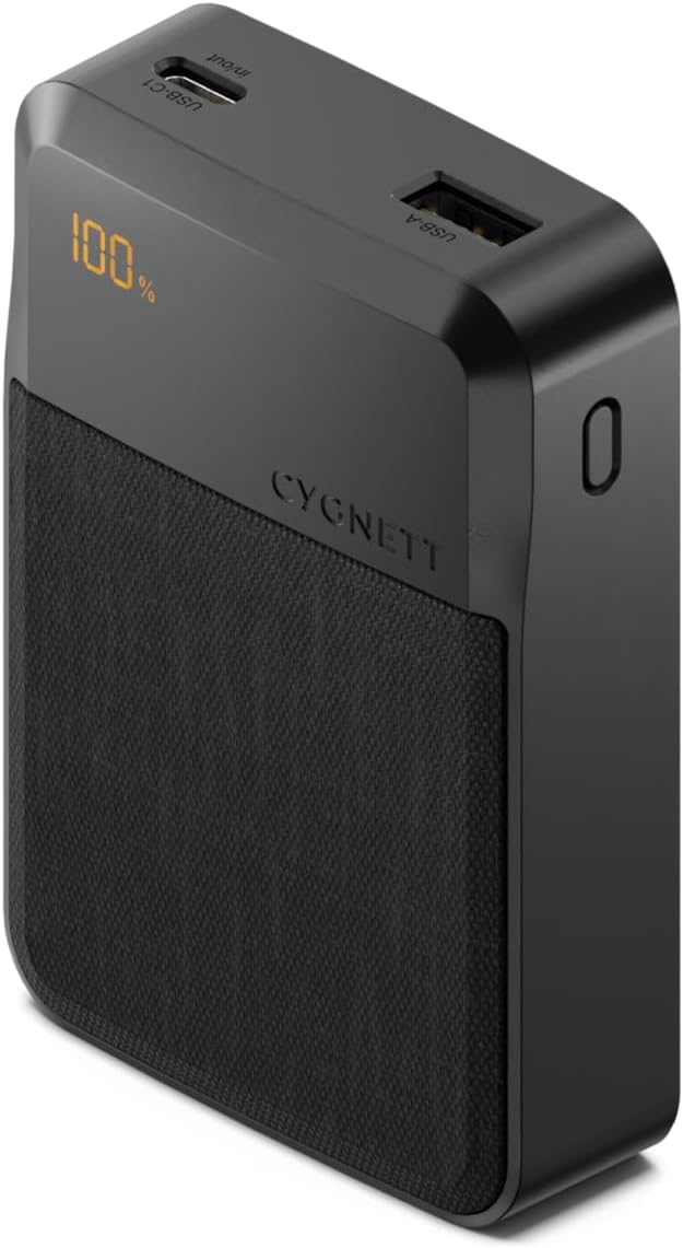 Cygnett Reserve Power Bank showing 100% charge on its digital display, with USB-C and USB-A ports visible.