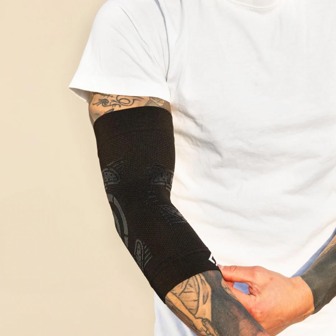 FLOKY Elbow Support gomitiera biomeccanica. Multisport. Stabilizza il gomito. Riduce le infiammazioni articolari ed il recupero. Protegge tendini e muscolatura. Design ergonomico. Nera. (L/XL)