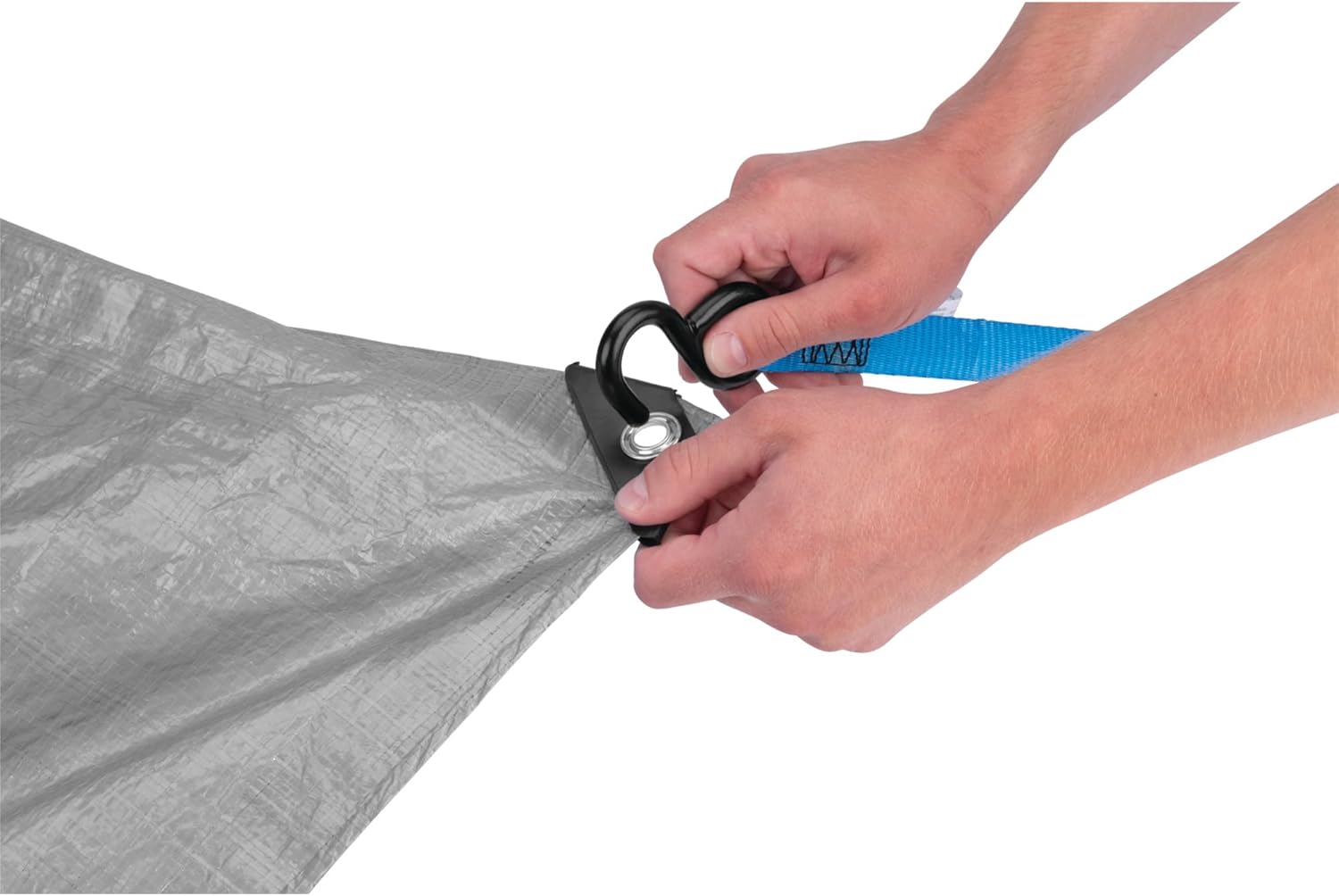 Roof of a house covered with a silver tarp