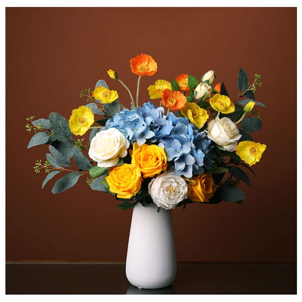 Arrangement de fleurs artificielles pour eguayer votre salle a manger