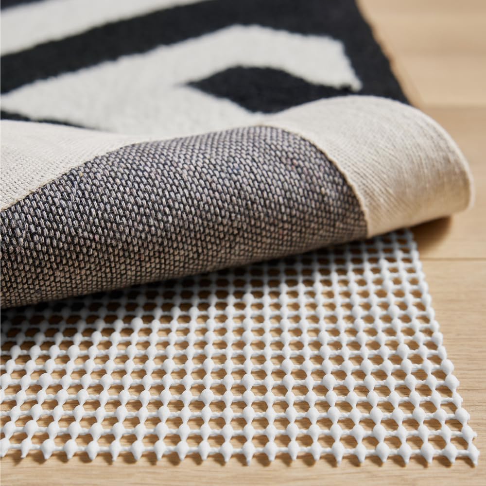 Strong Rug Pad Gripper, US Designed, Grips Help Keep Area Rugs Safe and in Place, Slip and Skid Resistant Pads for Hard Floors, Under Carpet Mat Cushion and Hardwood Protection 2x3 FT