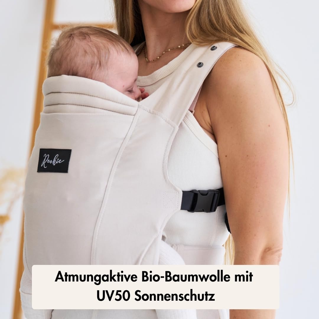 Rookie Babytrage ab Geburt - Ergonomisch, Bequem, Bio-Stoffe - Premium Elite Design - Baby Trage schnell & einfach angelegt - Baby carrier für Neugeborene bis 2 Jahre (Beige)