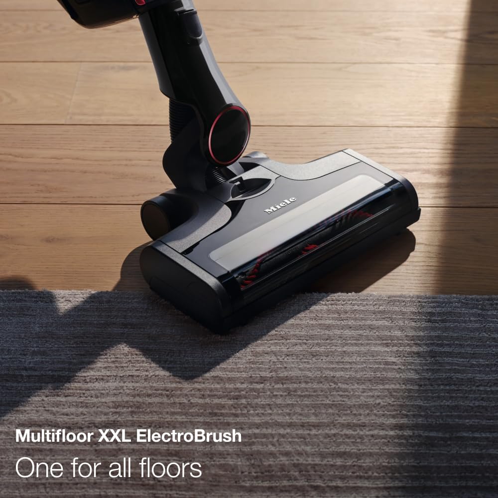 Close-up of the Miele Triflex HX1 Multifloor XXL ElectroBrush on a carpeted surface.