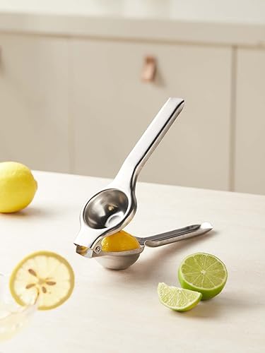 Exprimidor manual de acero inoxidable, exprimidor de mano resistente de limón, lima y cítricos con mango de metal para exprimir fácilmente frutas, disponible en Yaxa Colombia