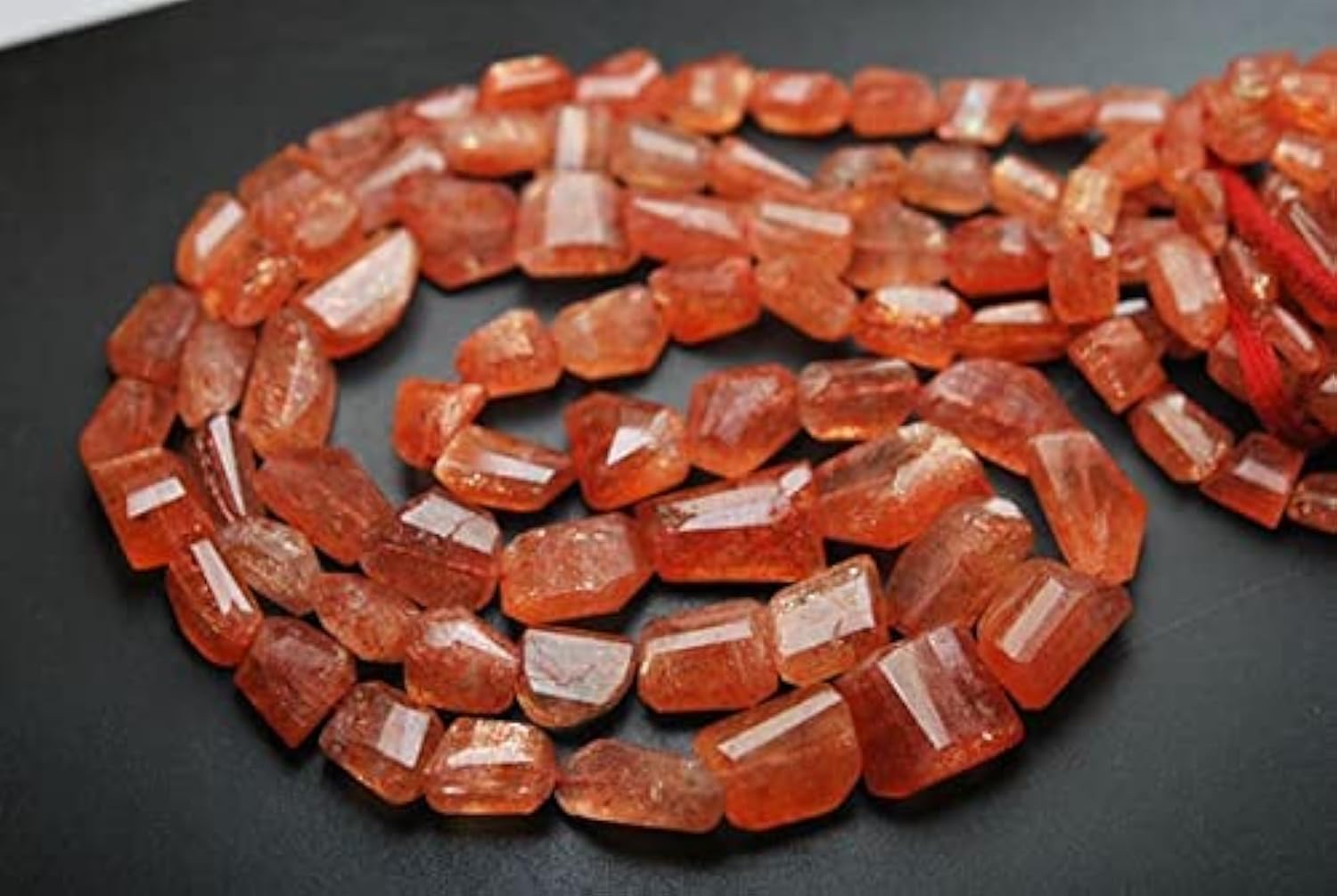 Pierre de soleil africaine naturelle en fil briolette facettée ovale LKBEADS