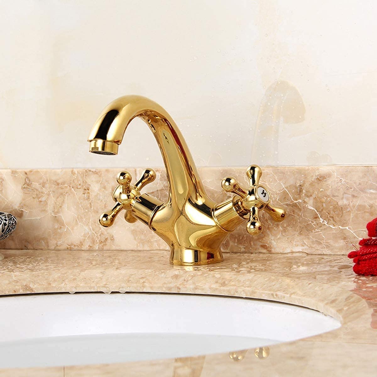 Grifo monobloc de latón para lavabo con doble manija reguladora de temperatura 8