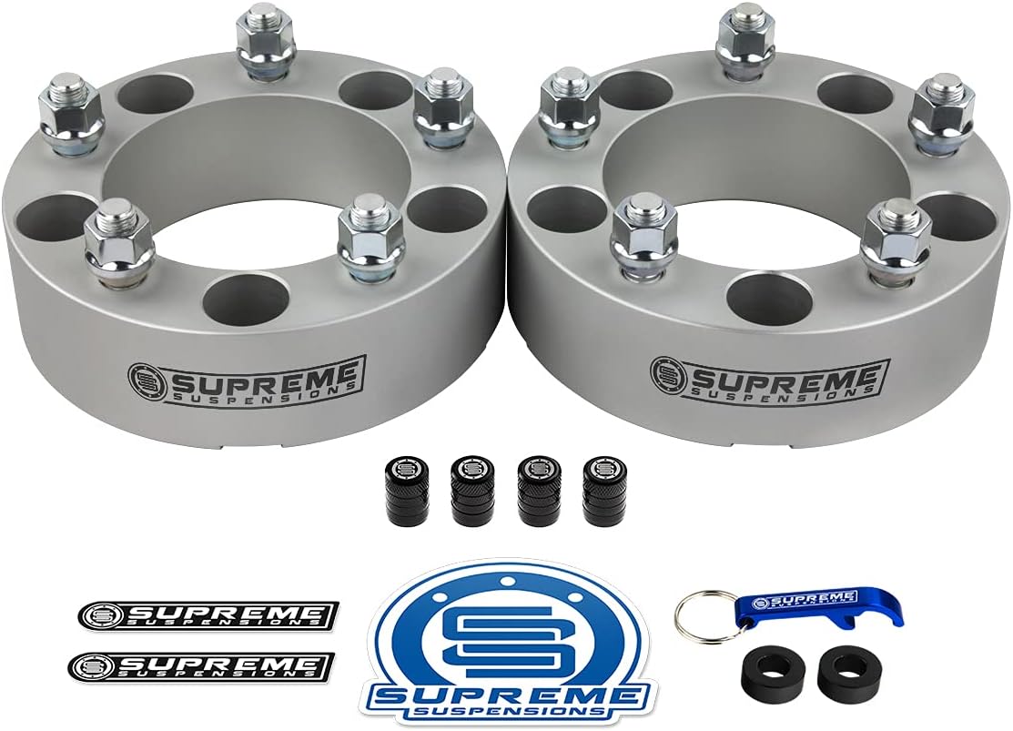 Supreme Suspensions - Set of 4 Silver 2-inch Wheel Spacers for 1976-1996 Ford F-150 / Bronco and 1994-2001 Ram 1500 (BP: 5 x 139.7mm / CB: 108mm / Studs: 1/2" x 20) - 4 Tire Valve Caps Included