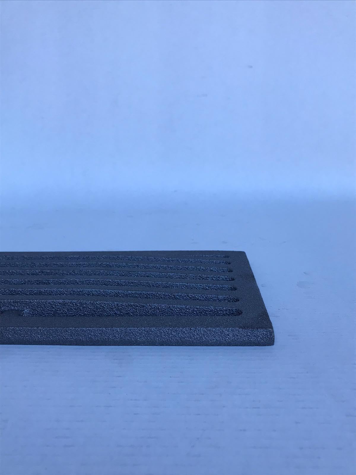 Griglia 15x27,5 cm in ghisa per camino