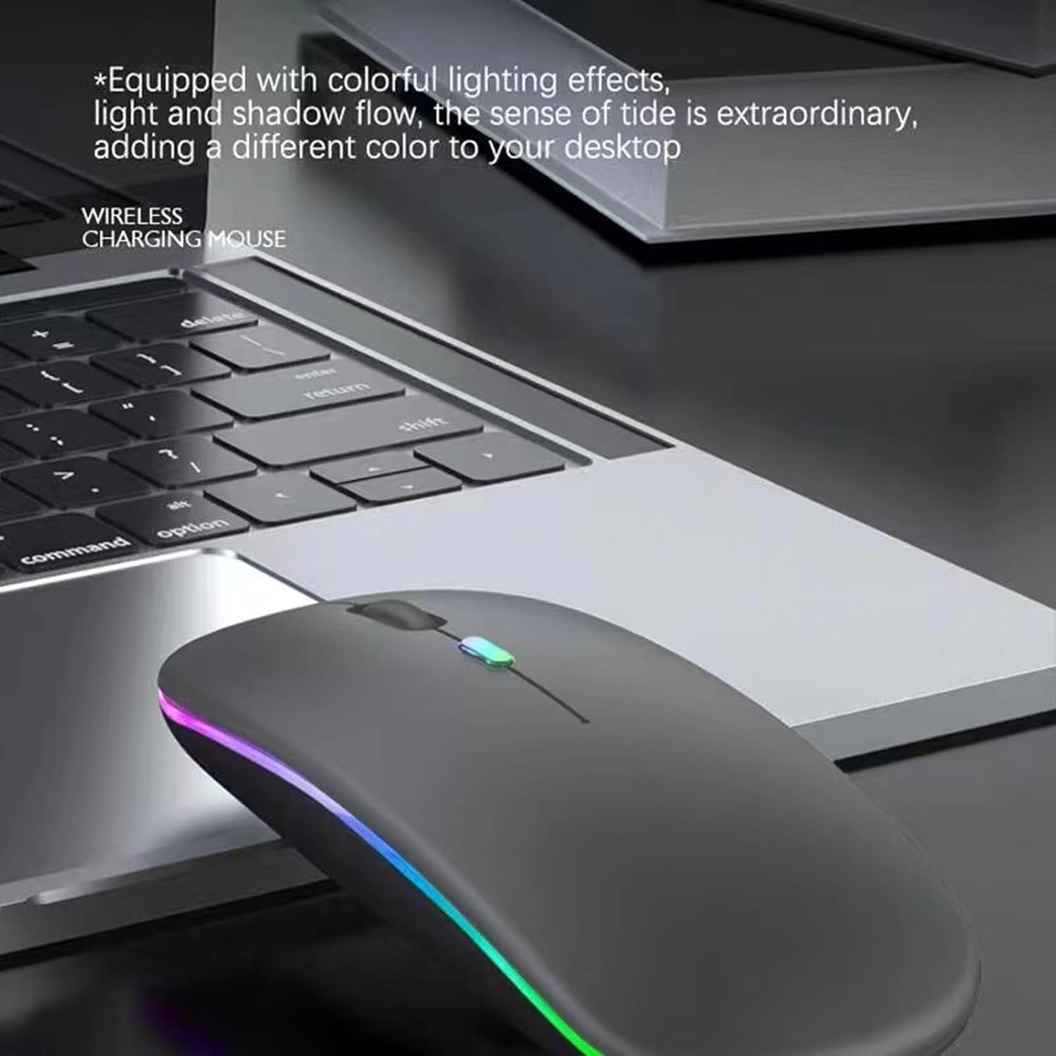 Wireless mouse on a laptop, showing its colorful LED lighting