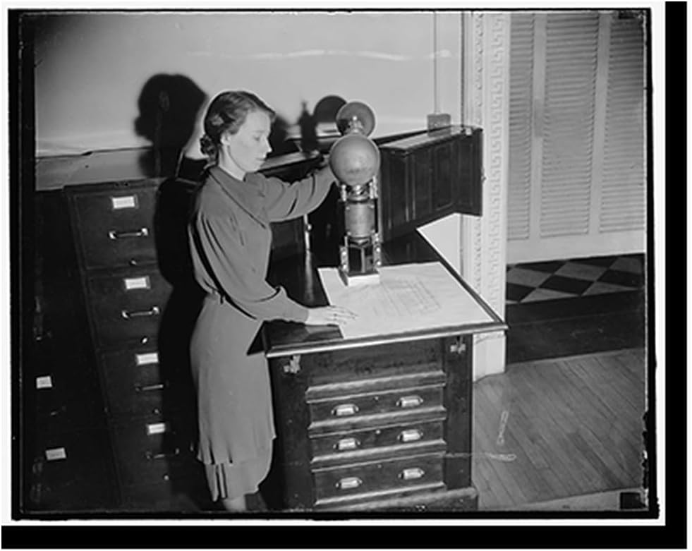 Affixes U.S. seal to all state documents. Washington, D.C., Jan. 8. Mrs.. Helen S. Bru, clerk in the State Department's Appointment Section, affixes the great seal of the United States to about 120...