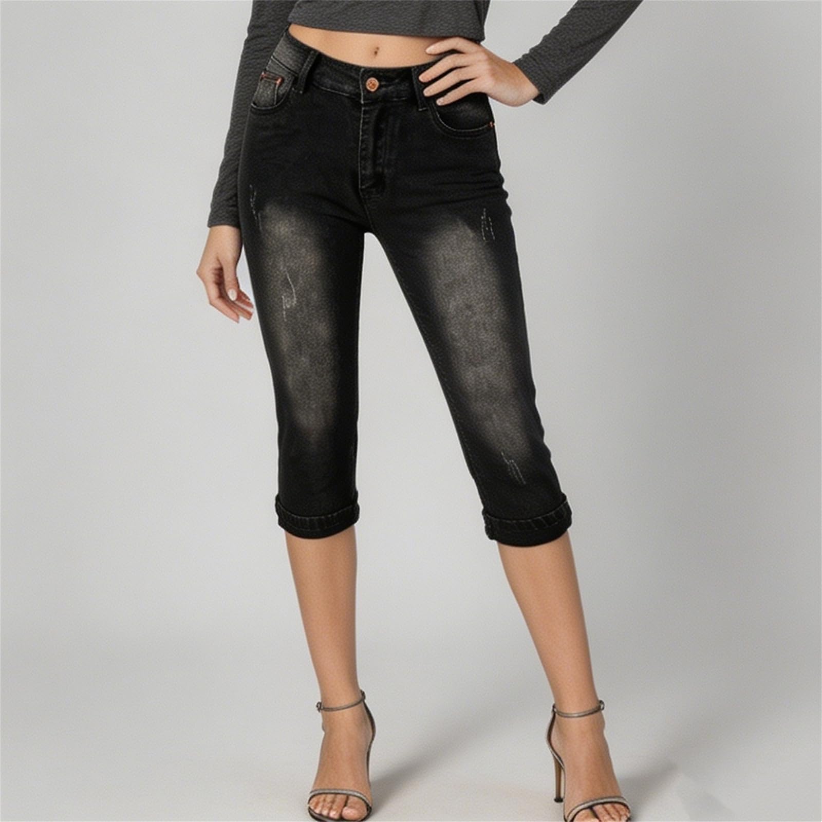 Jeans da Donna Slim-Fit Strappati con Risvolto | Jeans cropped elasticizzati a vita media con effetto vissuto, modello slim fit con baffature e risvolto sul fondo