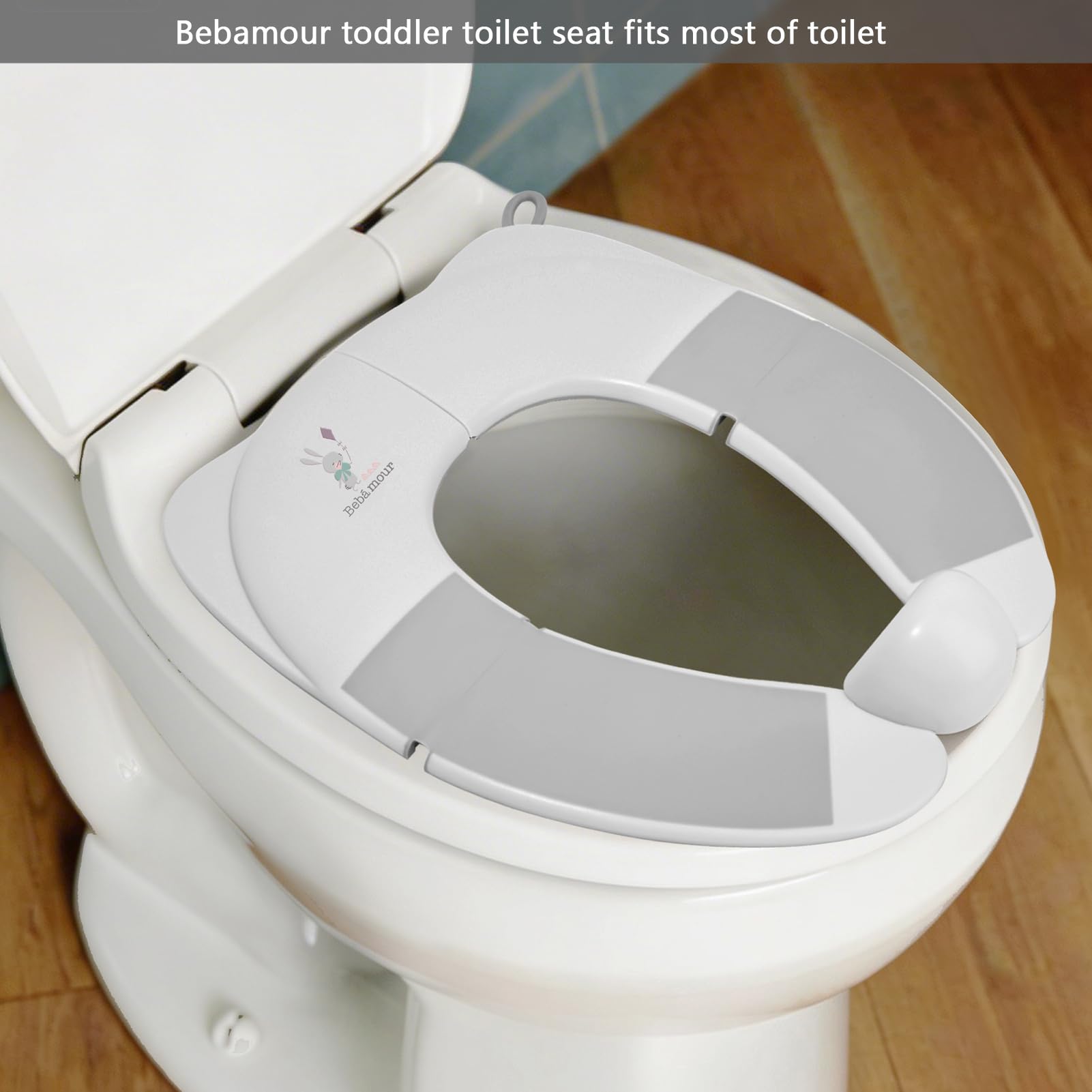 Bebamour Sedile WC pieghevole per bambini, portatile, da viaggio, con cuscinetti antiscivolo e paraspruzzi, compatto e leggero, adatto per WC standard del Regno Unito,coniglio