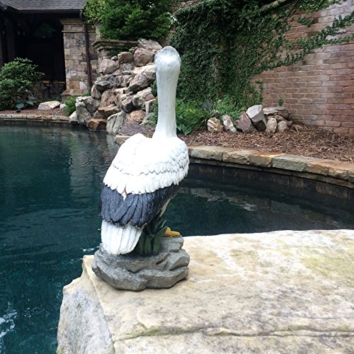 Homestyles 20 In. Pelican On Ocean Coastal Rock Collectible Beach Statue-Natural Finish #TOP3