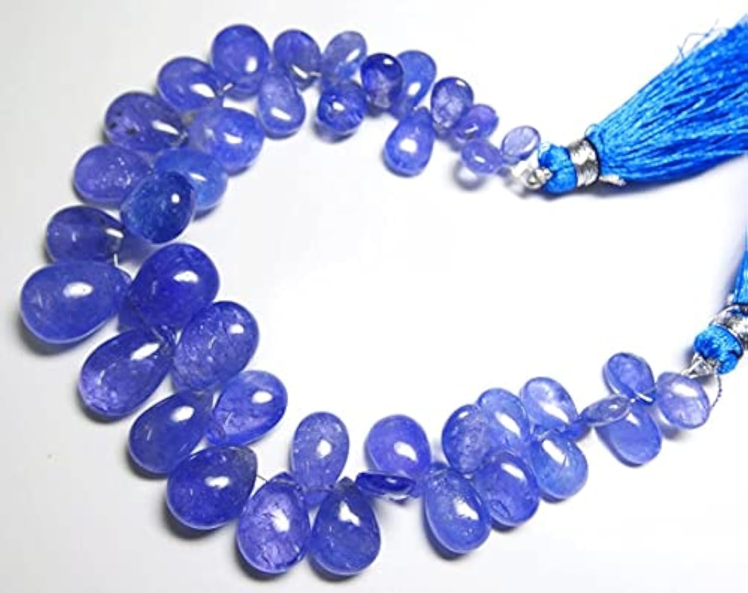 Tanzanite en perles poires lisses pour illuminer vos tenues de soirée chic
