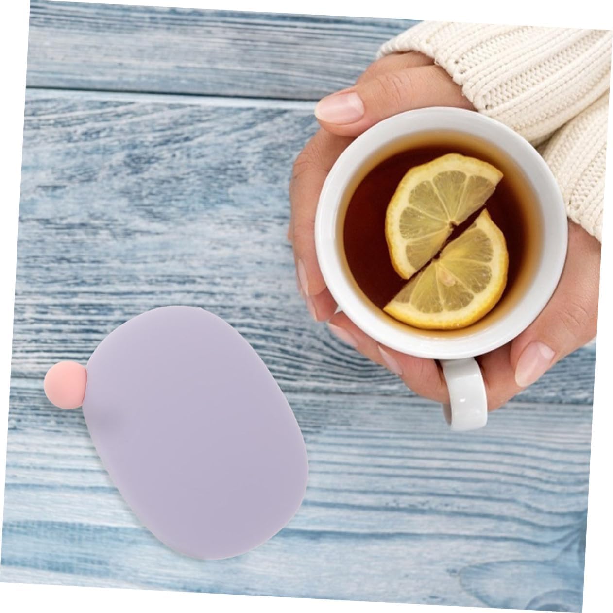 Hand warmer showing size and use