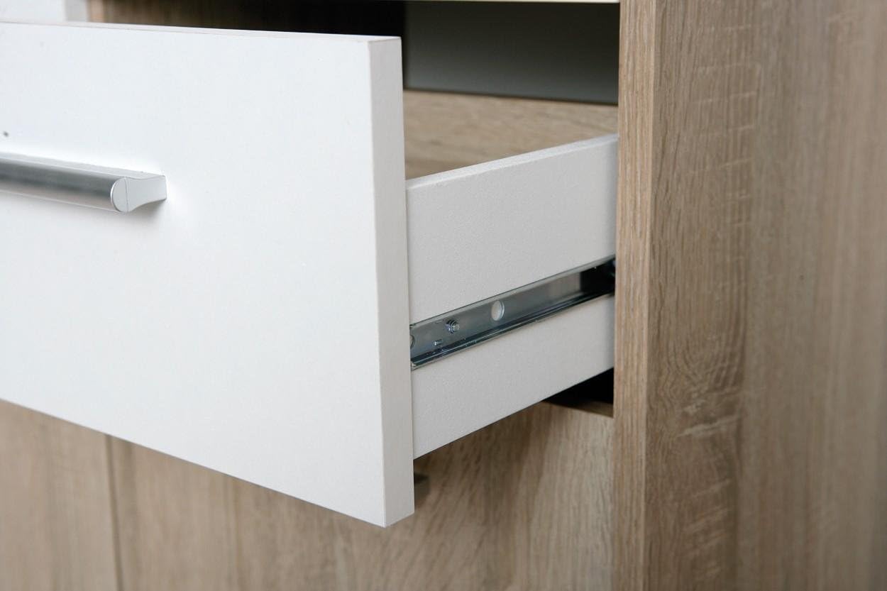 Close-up of dresser drawer with metal guide ways.