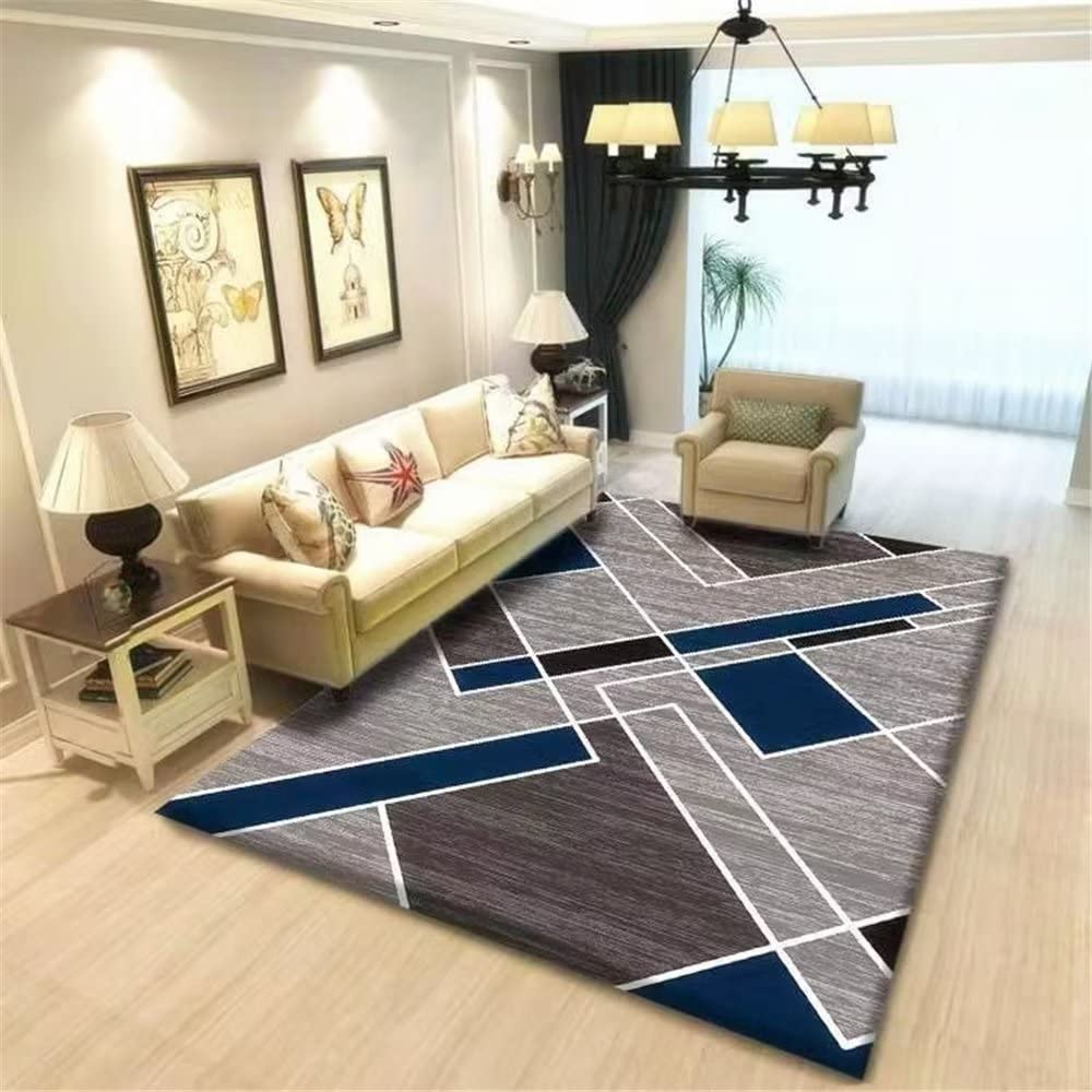 Tapis salon aux motifs géométriques bleus pour créer une ambiance moderne