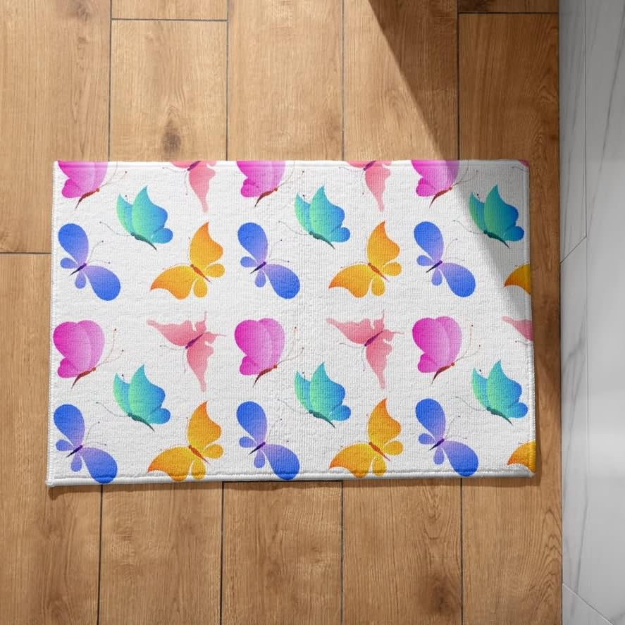 Tapis d'entrée extérieur motif papillon CEVAN idéal pour sublimer votre pas de porte